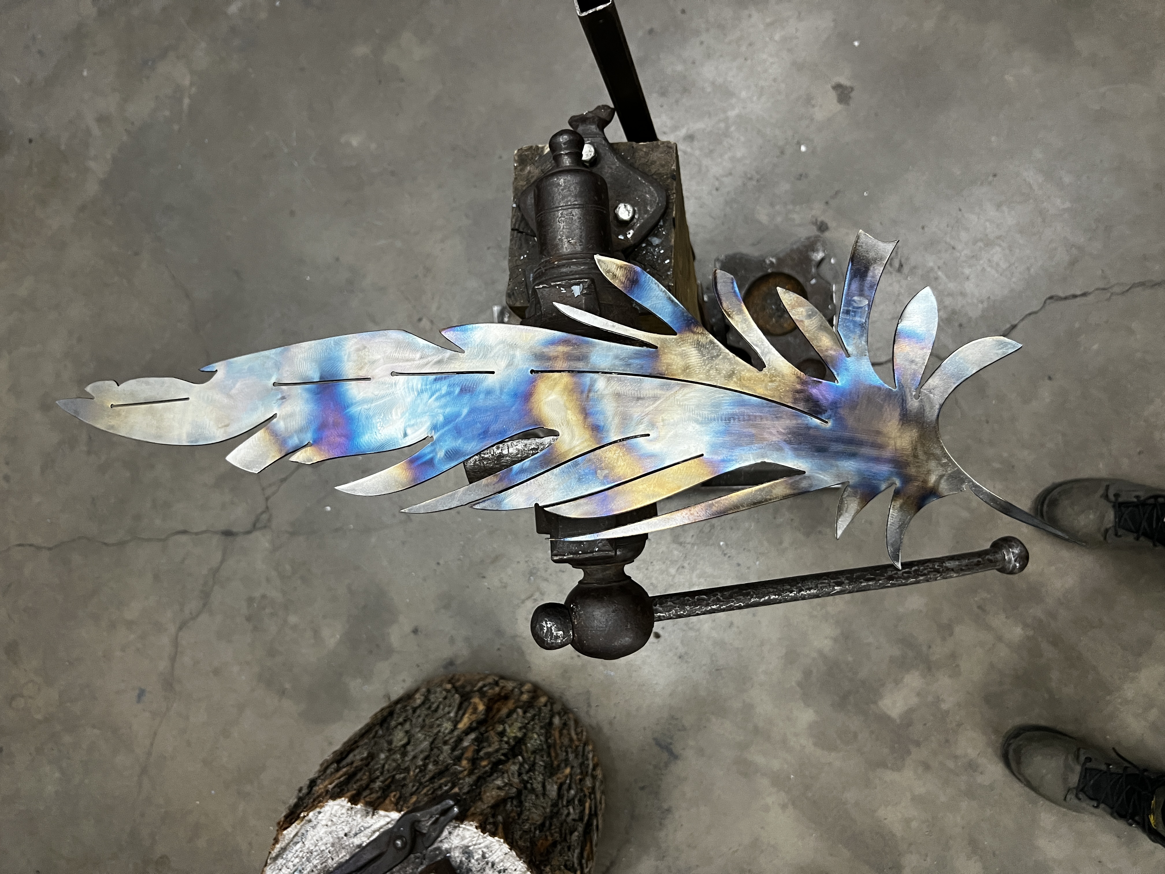 Metal feather